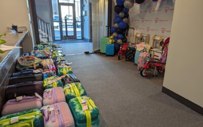 Apex CPAs & Consultants Raise $50,000 in 10th Annual Luggage of Love Campaign Benefitting CASA Kane County